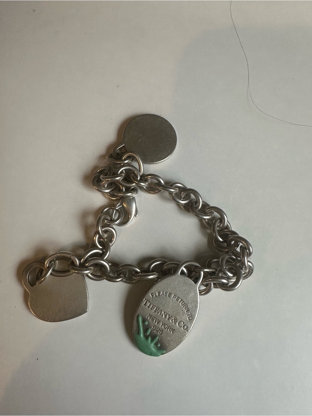 Tiffany & Co. Silver Charm Bracelet with Green Enamel Accent